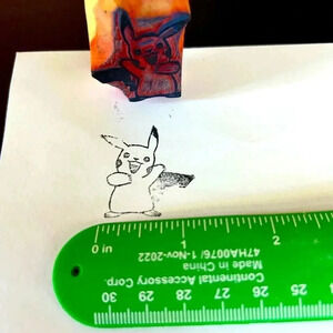 GUC Pokemon Pikachu rubber stamp with wooden handle. Measures 1 inch. Collect